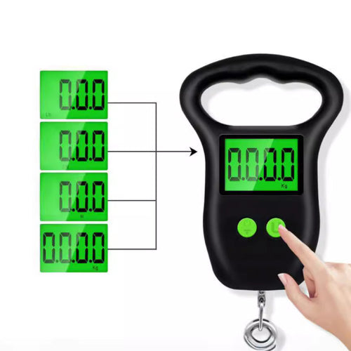 Digital luggage scale with green display and black casing, being held by a hand.